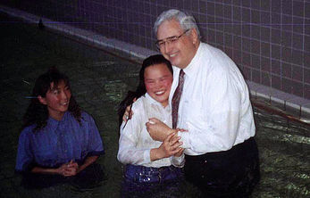 Pr. Folkenberg with Davakhuu and Enkhee. First Baptism.